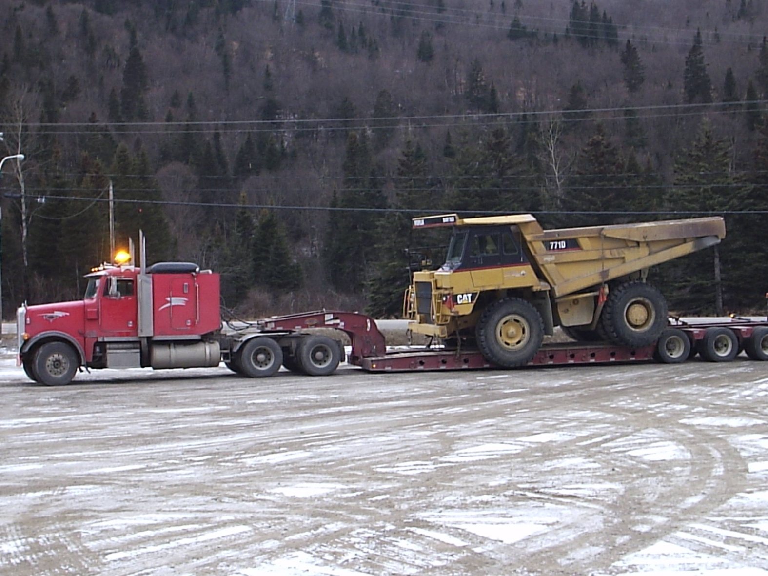 Équipement lourd transporté par SM Plus en hiver